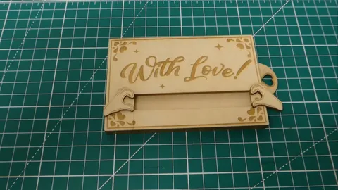 Laser cut wooden gift card box with interactive sliding heart mechanism revealing custom business card.